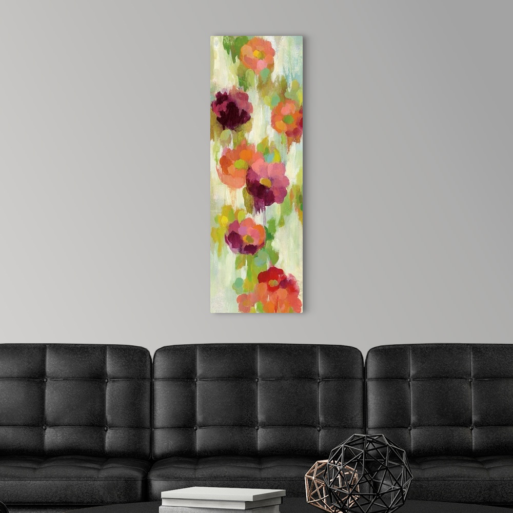 A modern room featuring Contemporary vertical painting of several flowers in red and purple.