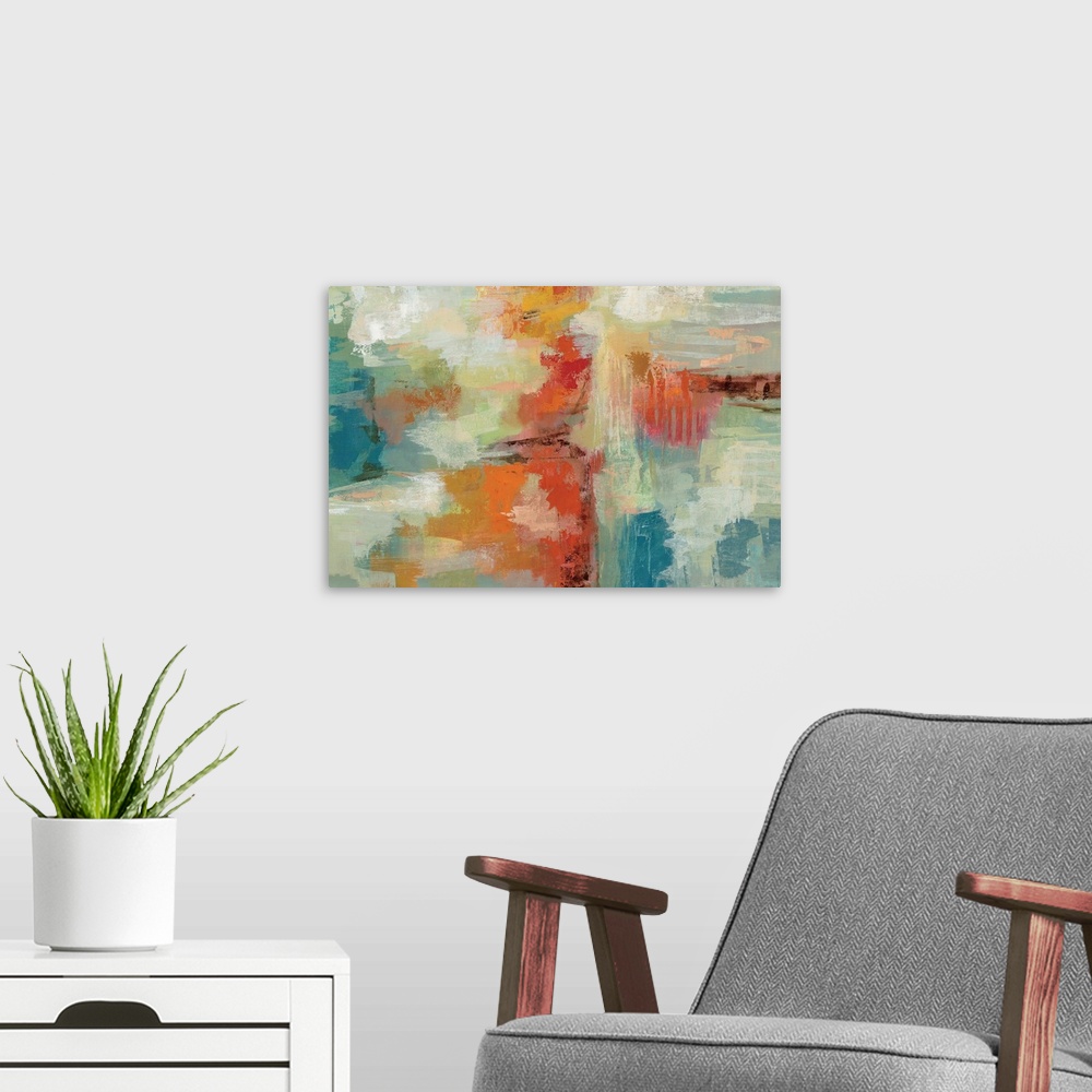 A modern room featuring Contemporary abstract artwork in bright oranges and blues.