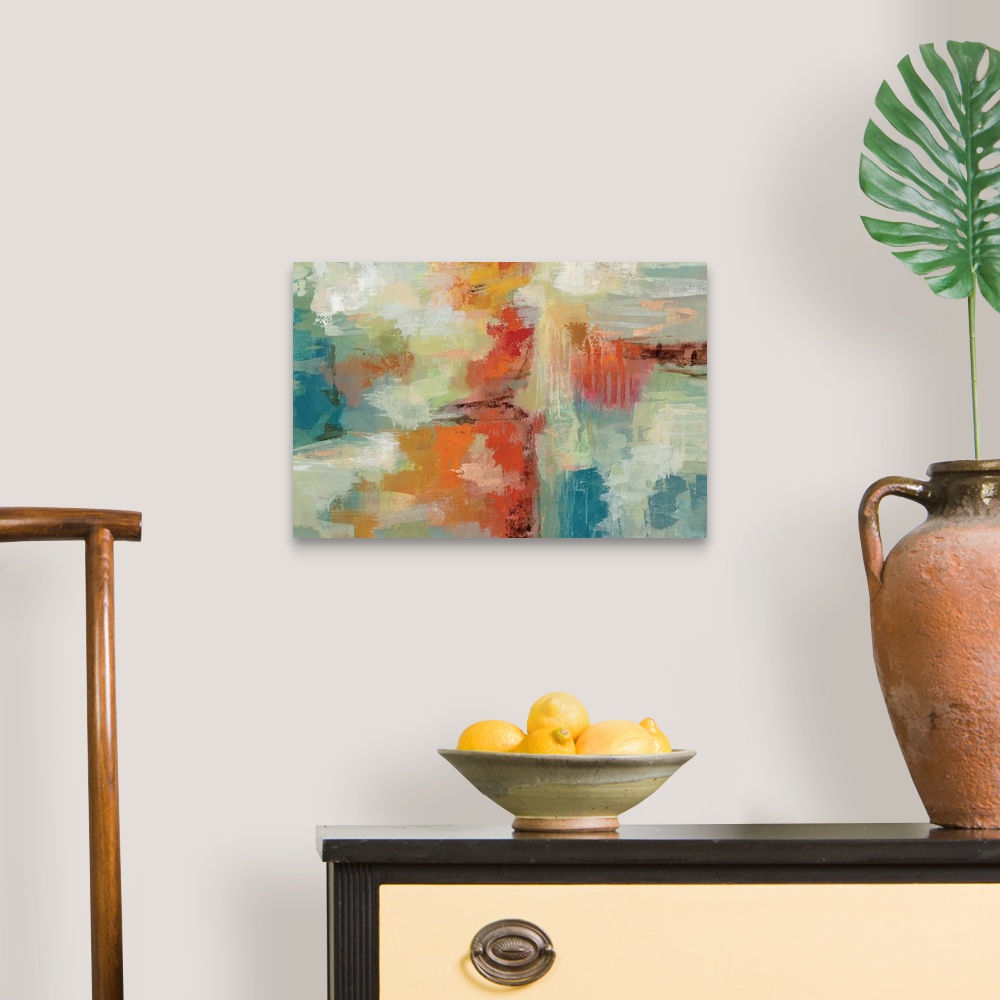 A traditional room featuring Contemporary abstract artwork in bright oranges and blues.
