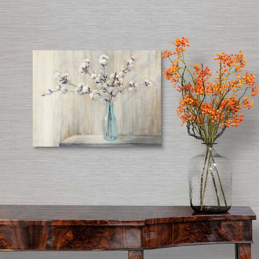 A traditional room featuring Still life painting of a cotton bouquet in a glass bottle with a neutral colored background.