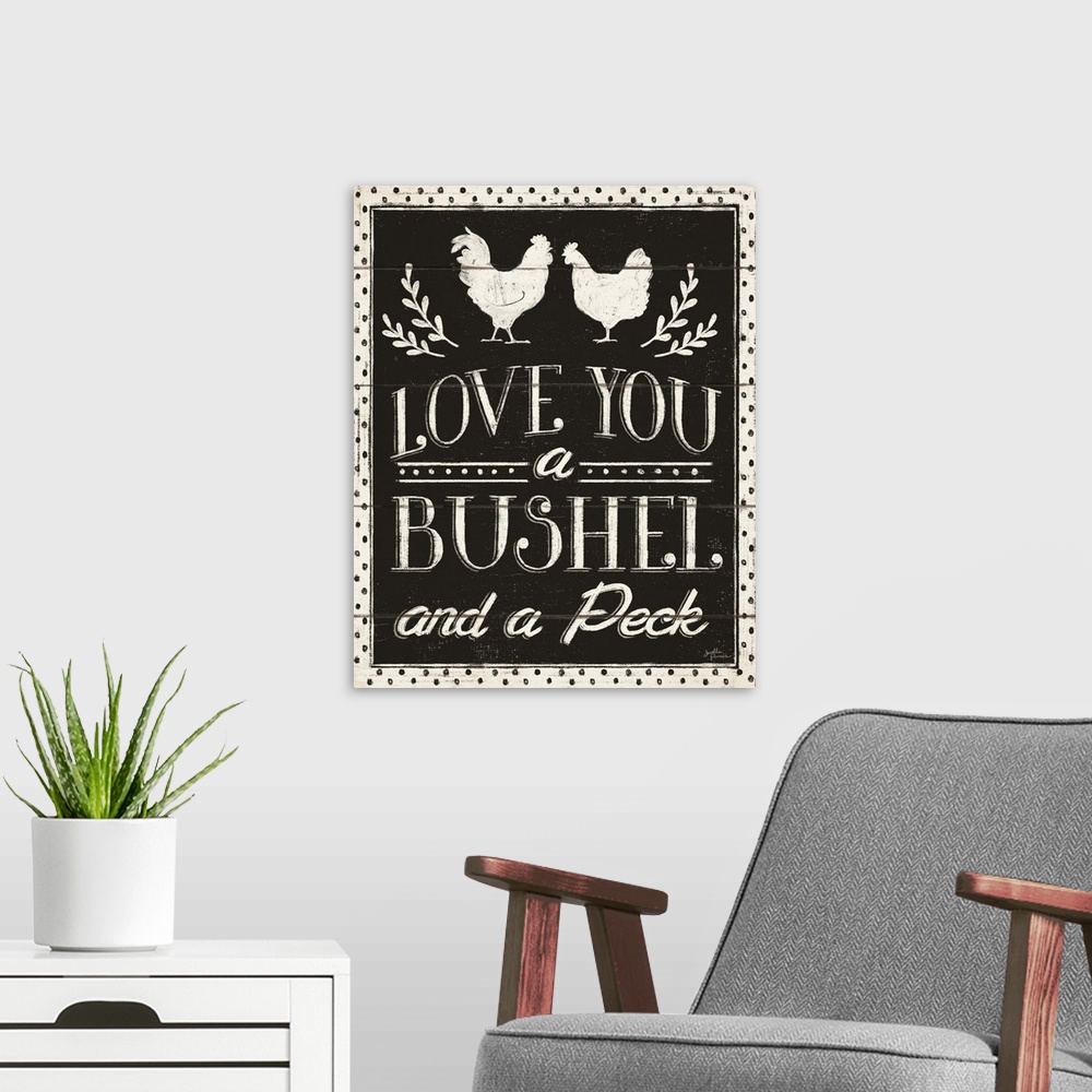 A modern room featuring Decorative country art featuring the words, 'Love You a bushel and a peck'.