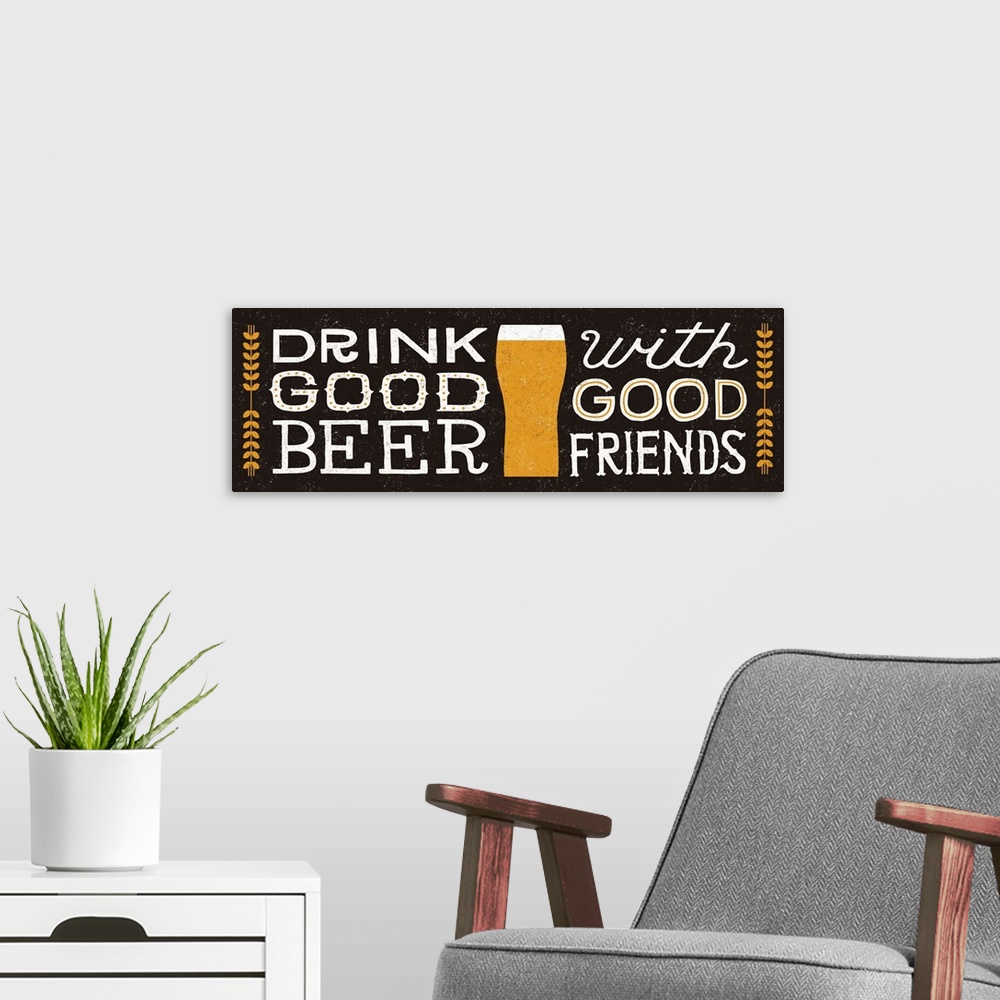 A modern room featuring Retro style sign reading "Drink good beer with good friends" with a glass of beer in the center.
