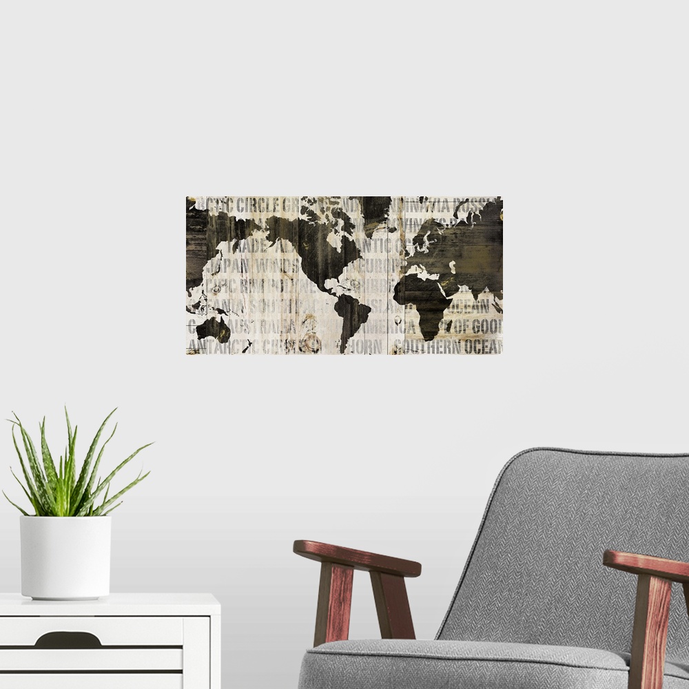 A modern room featuring Contemporary artwork of a world map in earth tones and covered in a faded text.