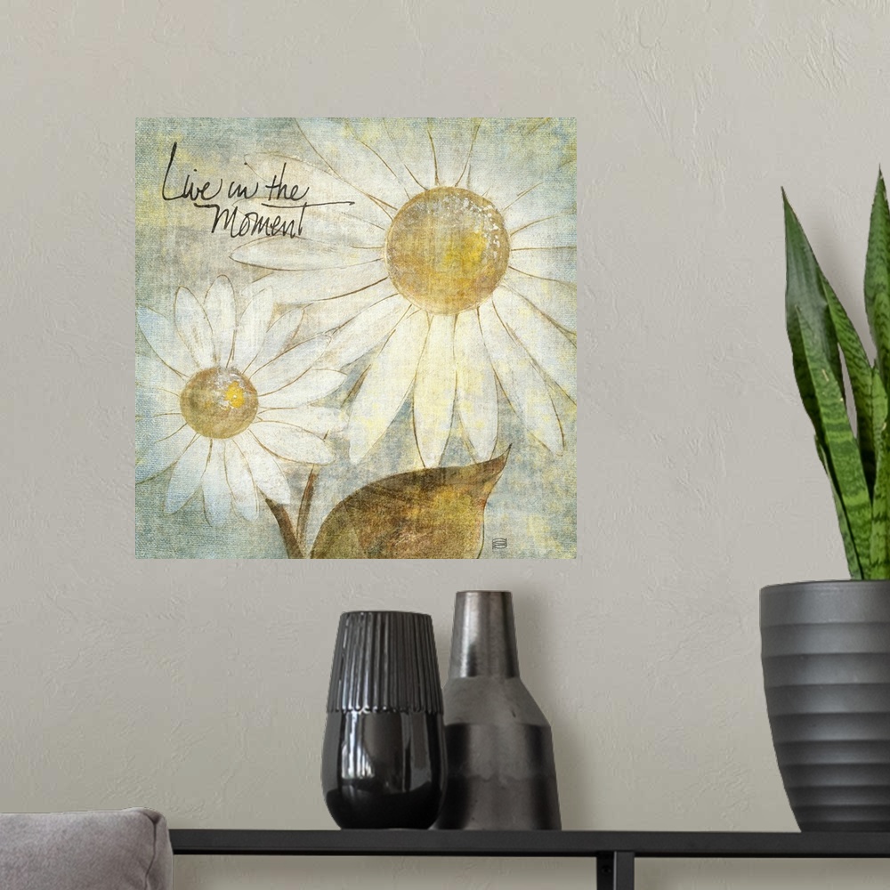 A modern room featuring A piece of artwork that contains two daisies and has a distressed look to the entire print. Text ...
