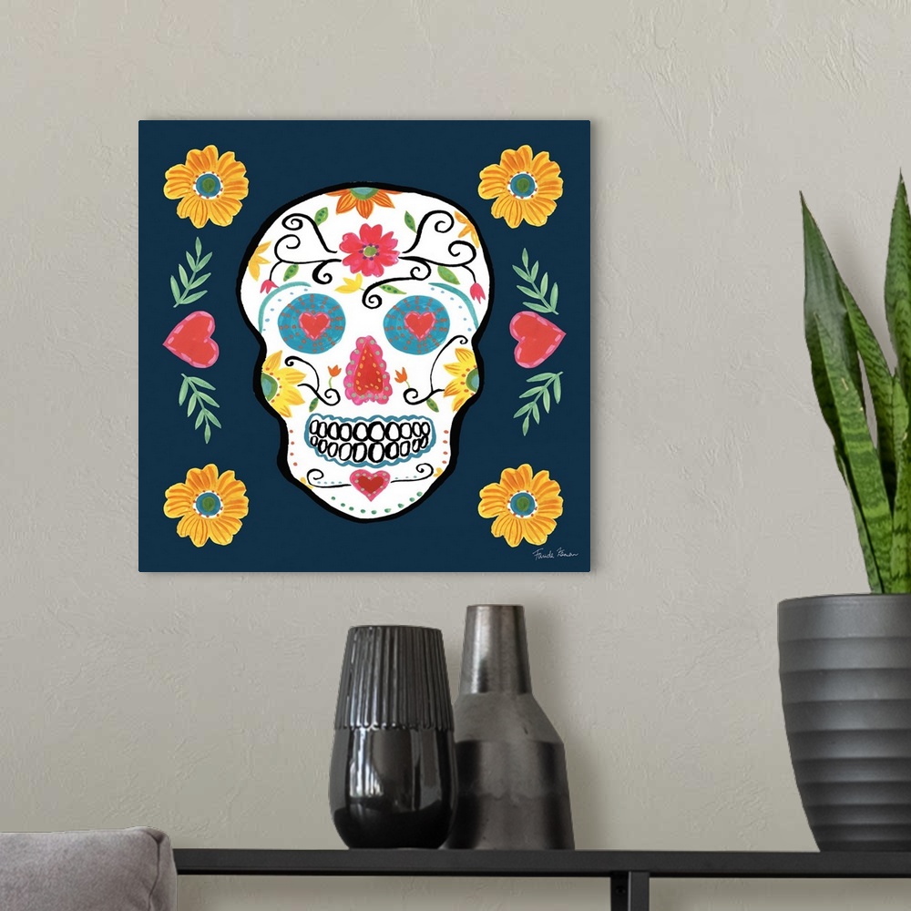 A modern room featuring Decorative artwork of a sugar skull over a blue background adorned with floral designs.