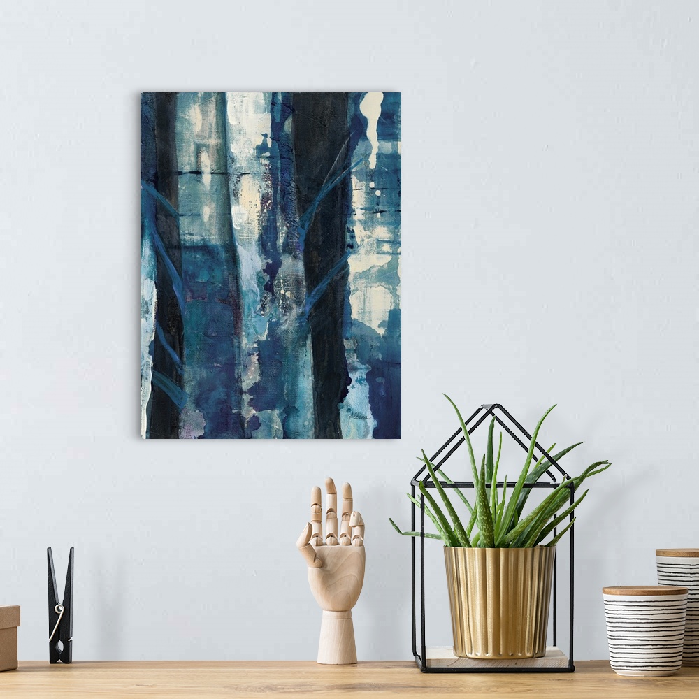 A bohemian room featuring Vertical abstract painting of textured roughed vertical lines in shades of blue.