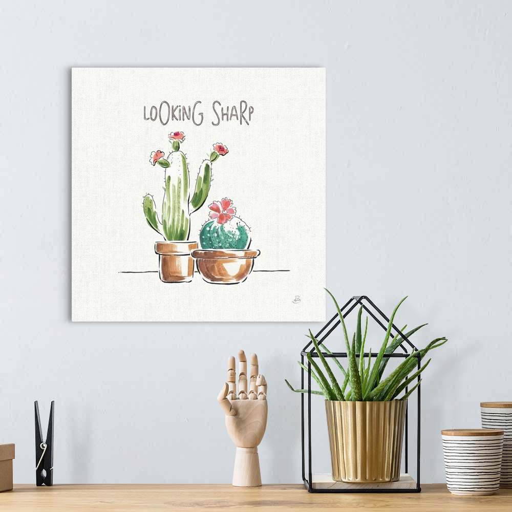 A bohemian room featuring "Looking Sharp" with illustrations of two cacti with pink flowers on a white and gray background.