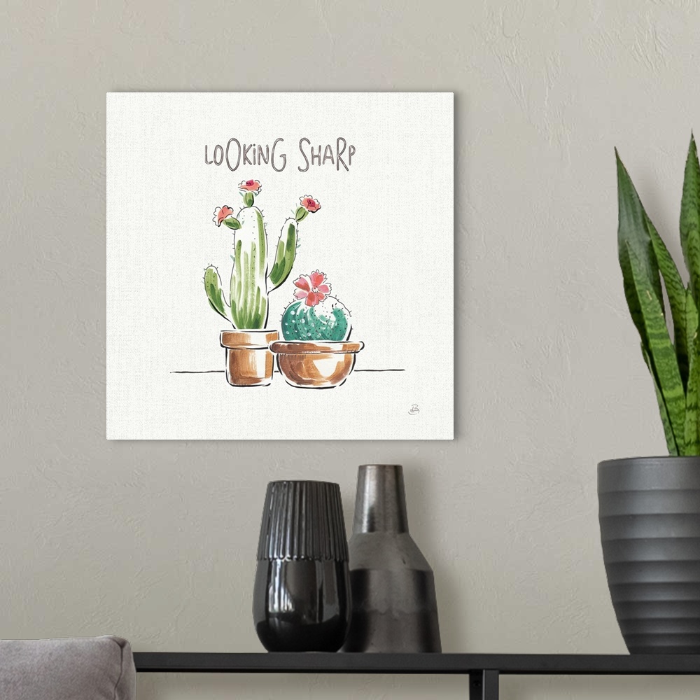 A modern room featuring "Looking Sharp" with illustrations of two cacti with pink flowers on a white and gray background.