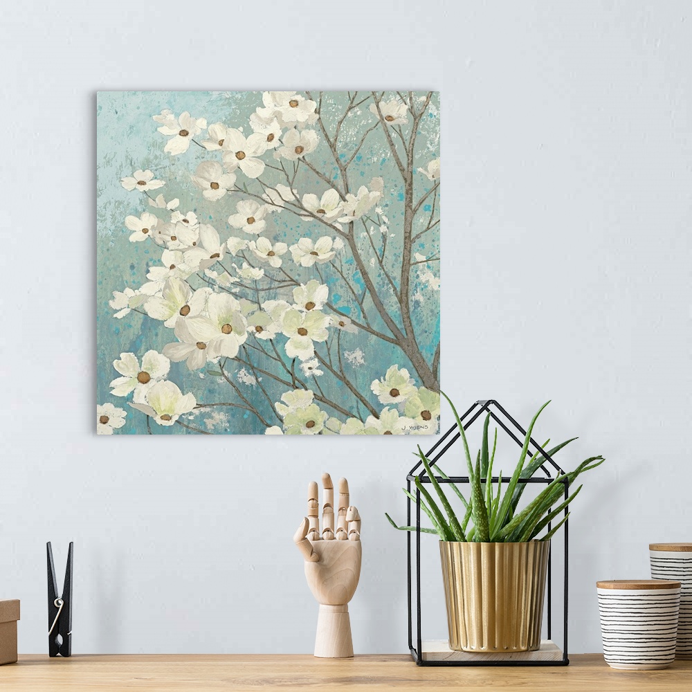 A bohemian room featuring Painting of flower filled tree branches.