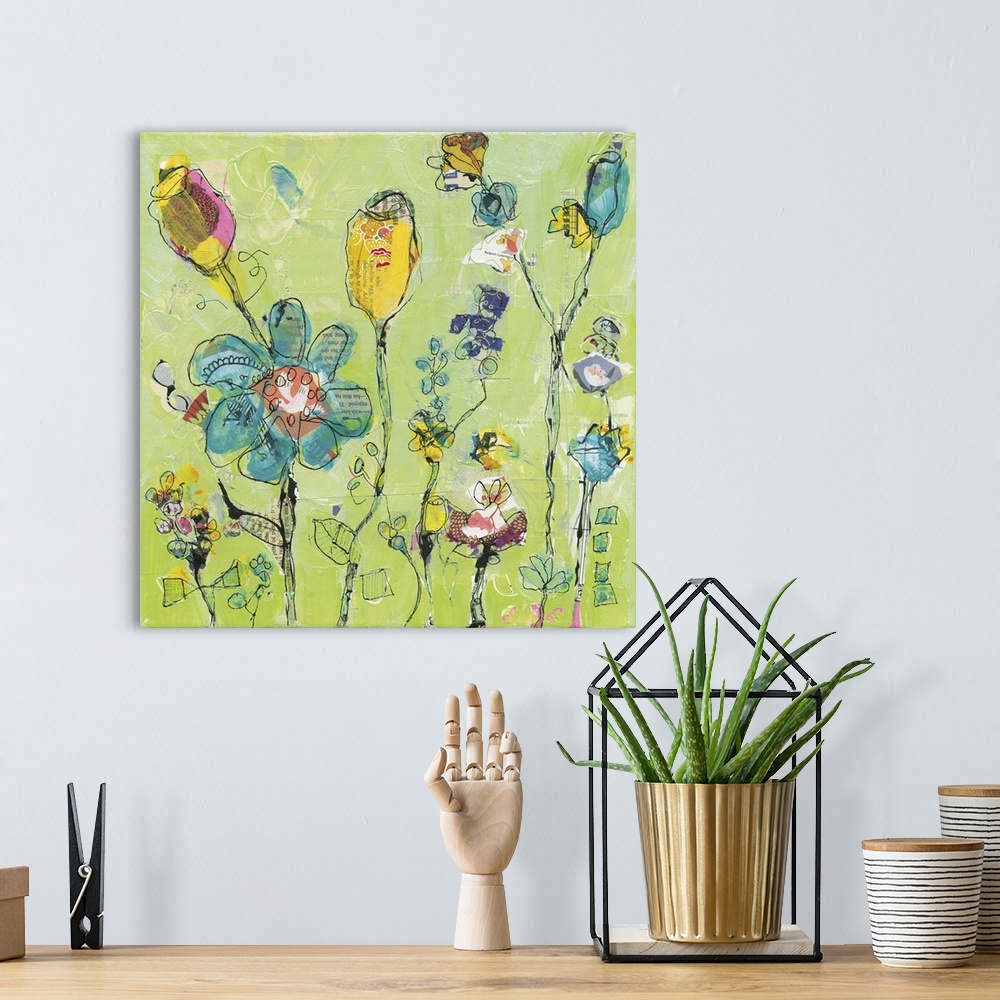 A bohemian room featuring Blue and yellow abstract wildflowers on a light green background made with mixed media.