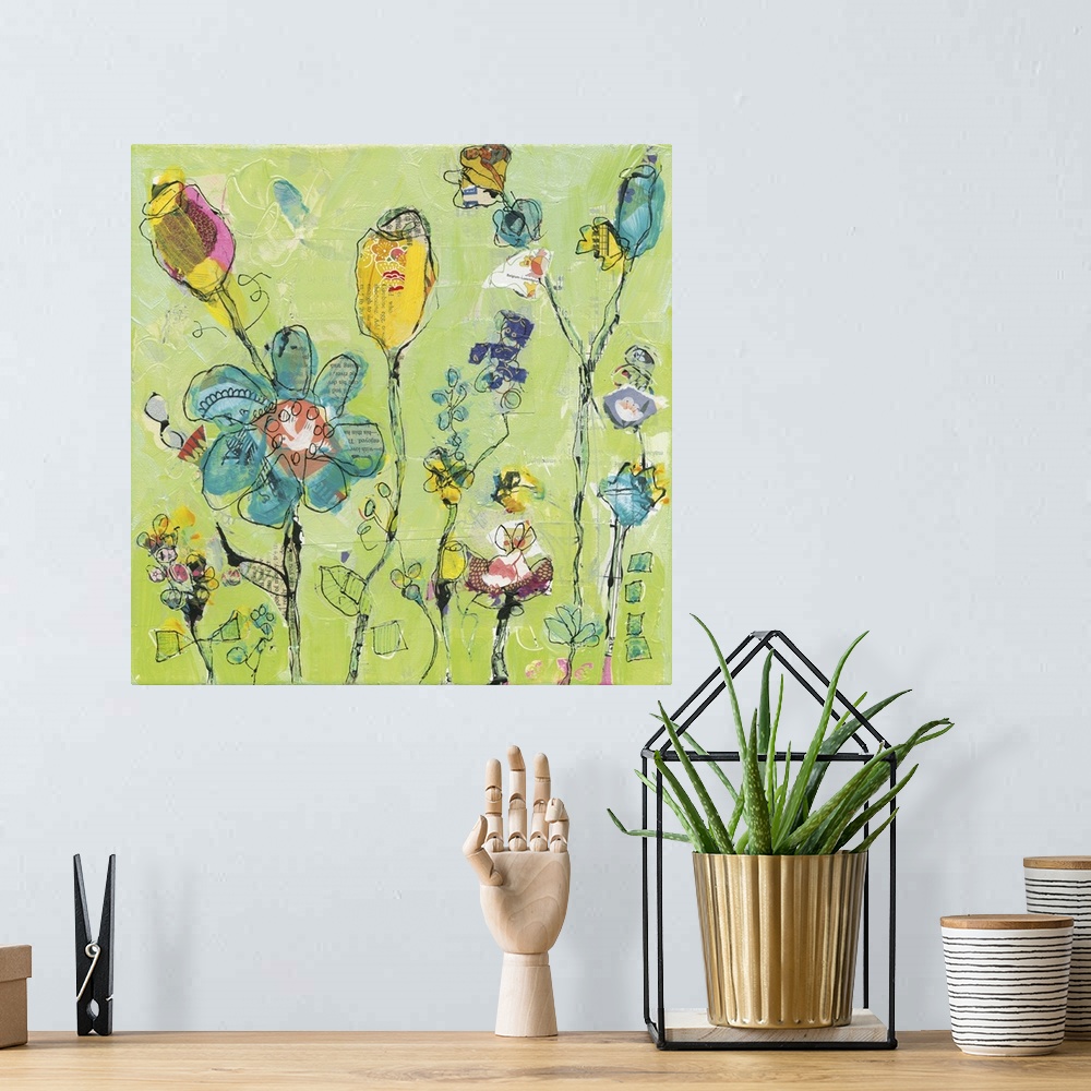 A bohemian room featuring Blue and yellow abstract wildflowers on a light green background made with mixed media.