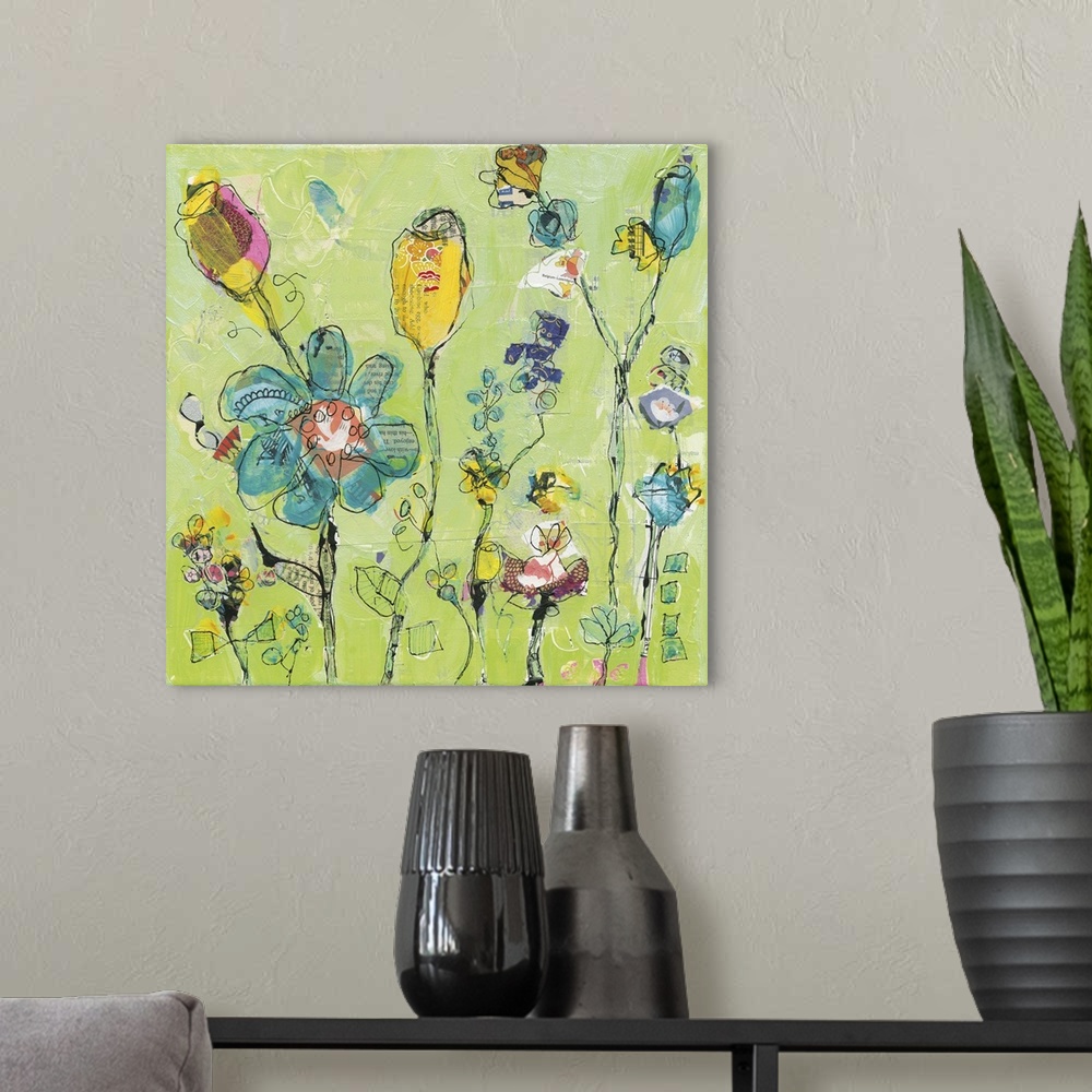 A modern room featuring Blue and yellow abstract wildflowers on a light green background made with mixed media.