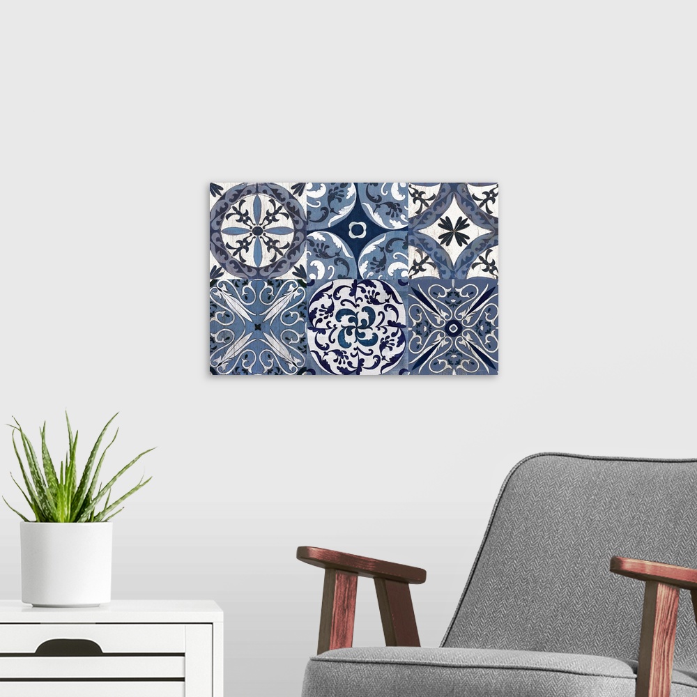 A modern room featuring Large contemporary painting of six square different tile-like designs in white and indigo.
