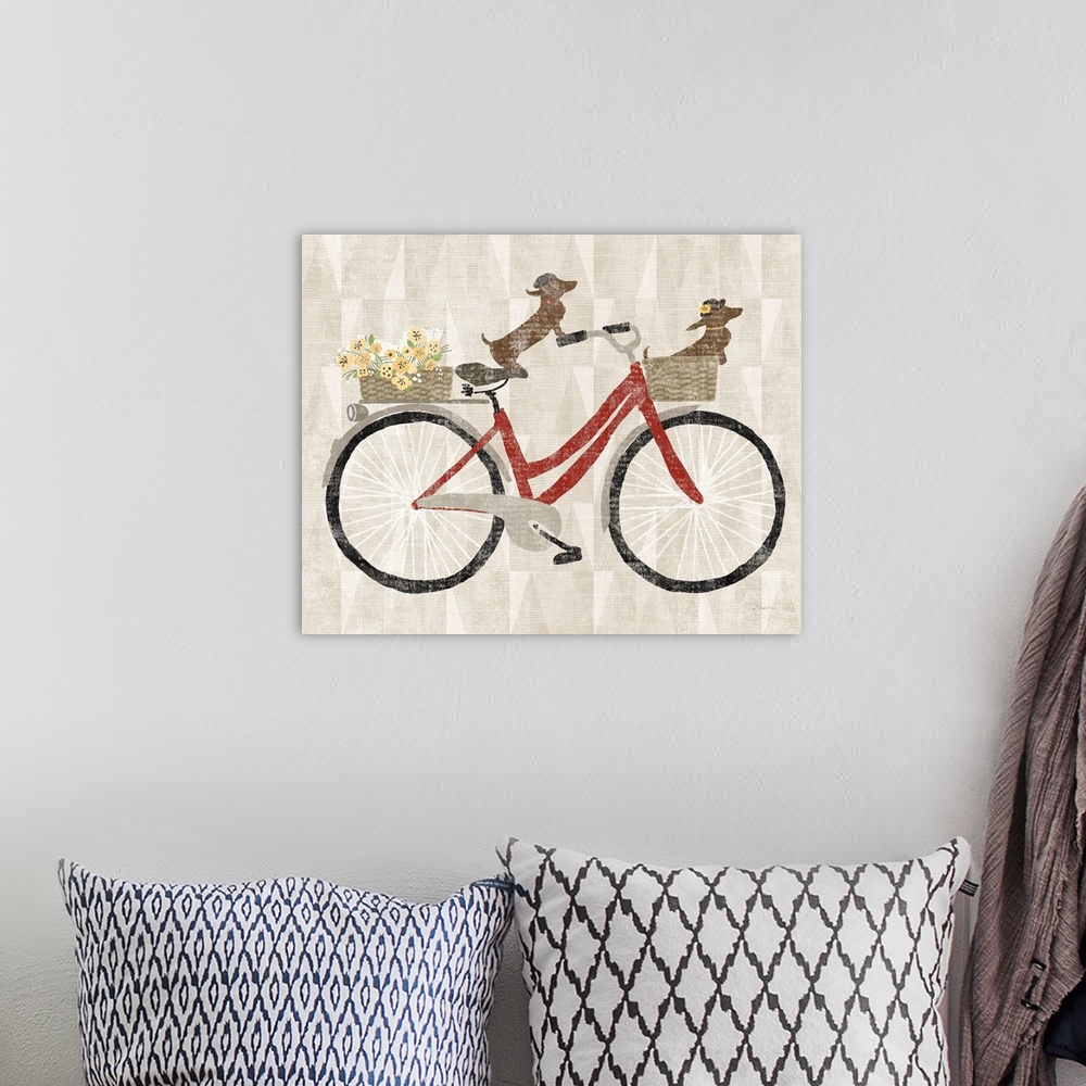A bohemian room featuring Decorative artwork of two dachshunds riding a red bicycle with a neutral backdrop.