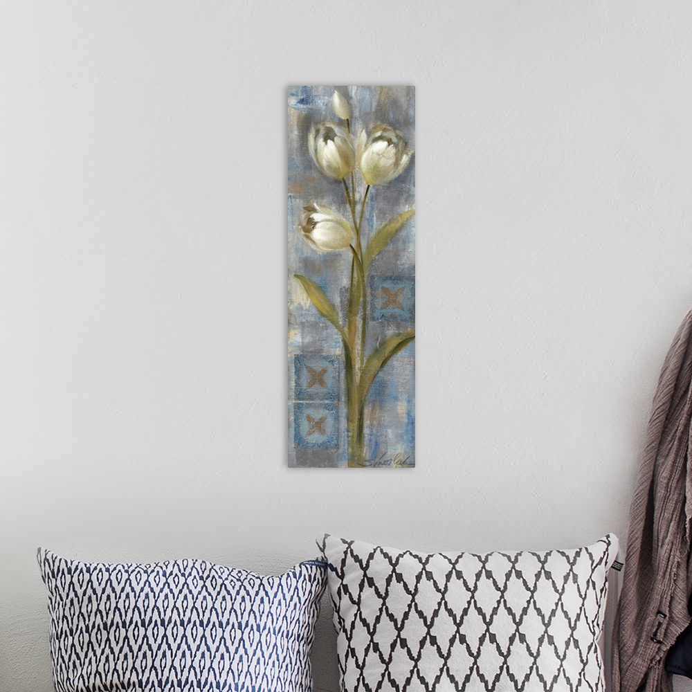 A bohemian room featuring Docor perfect for the home of tall white tulips that are painted against a cool background.