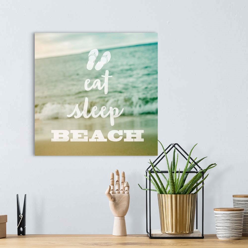 A bohemian room featuring "Eat Sleep Beach" in white text over a pastel image of the beach.