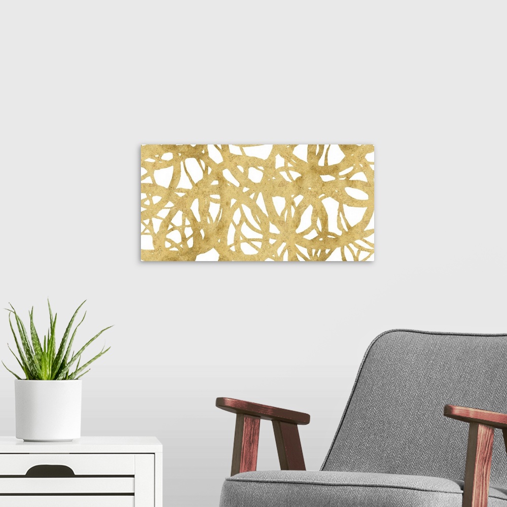 A modern room featuring Large abstract painting with a golden web-like design on a white background.