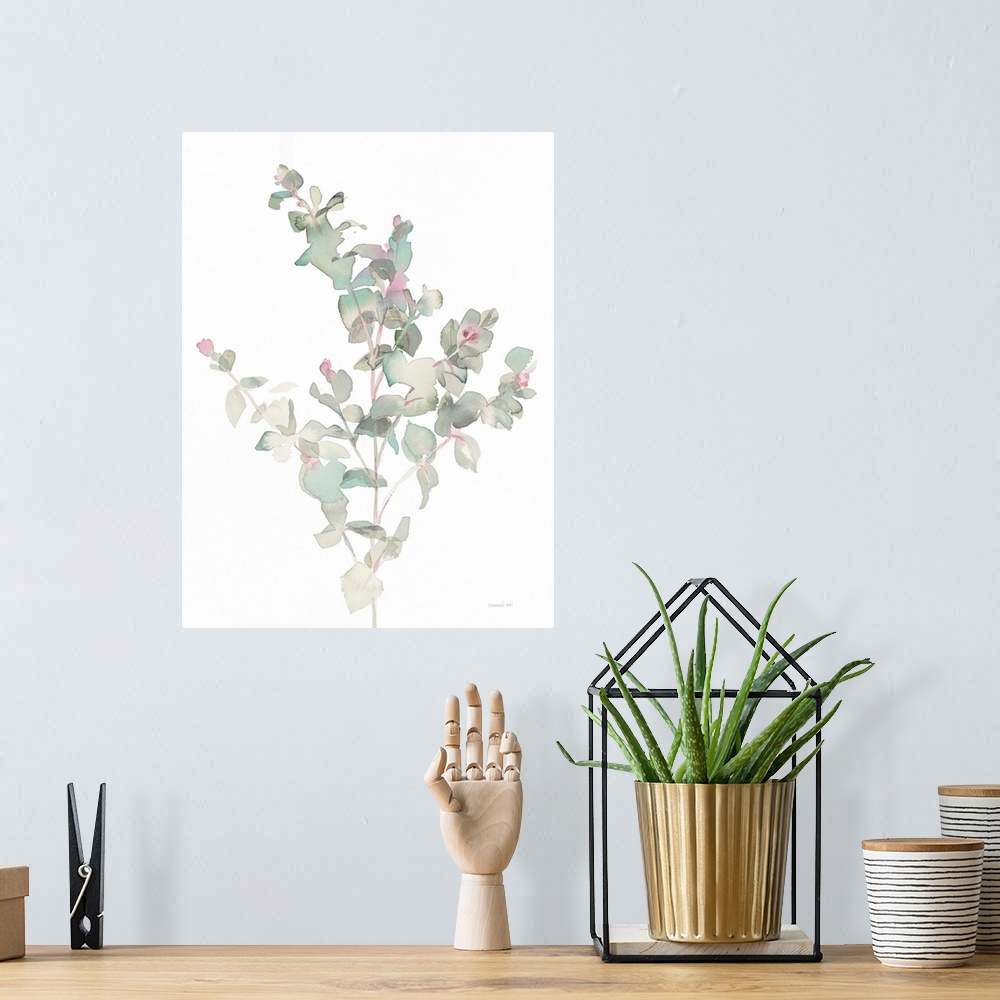 A bohemian room featuring Vertical watercolor painting of green, gray, and pink toned eucalyptus leaves on a white background.