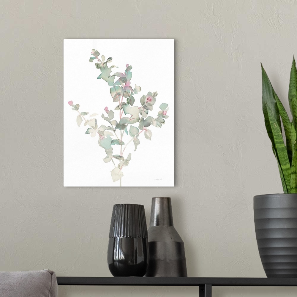 A modern room featuring Vertical watercolor painting of green, gray, and pink toned eucalyptus leaves on a white background.