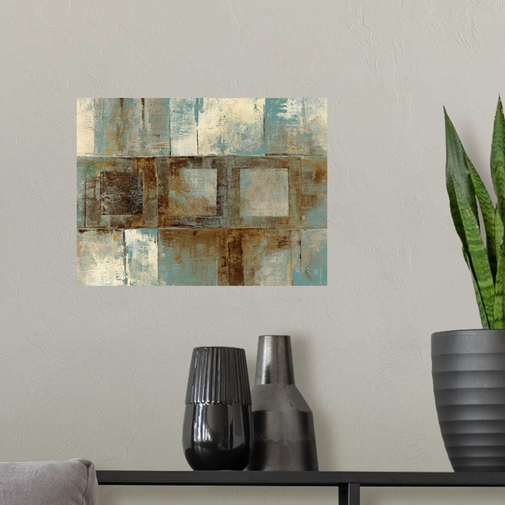 A modern room featuring Contemporary abstract painting of various grungy textured squares on a big canvas.