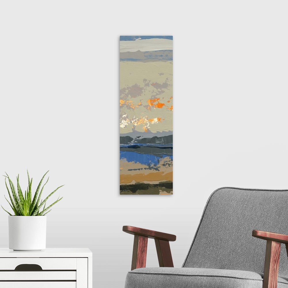A modern room featuring Contemporary abstract artwork of vibrant oranges mottled against subdued cool colors.