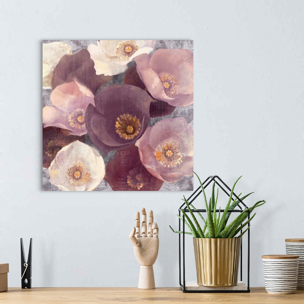 A bohemian room featuring Giant square floral artwork of a bunch of similar flowers in various colors, on a rough textured ...