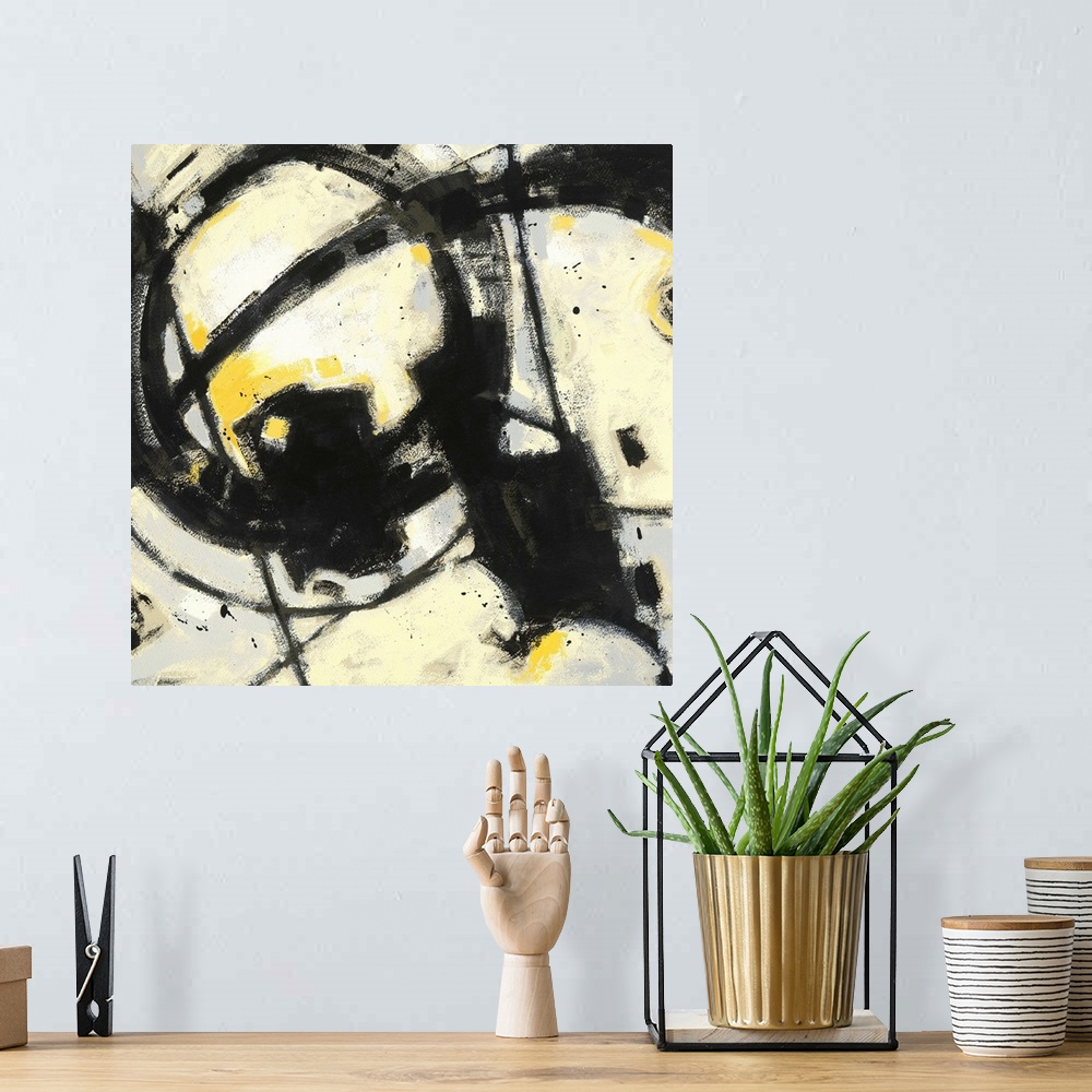 A bohemian room featuring Contemporary abstract painting using bold black lines and splashes of bright yellow.