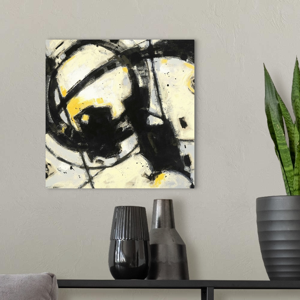 A modern room featuring Contemporary abstract painting using bold black lines and splashes of bright yellow.