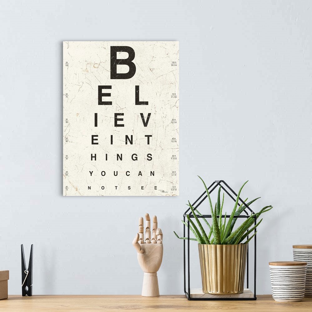 A bohemian room featuring Contemporary painting of an eye exam chart, spelling out an inspirational quote.