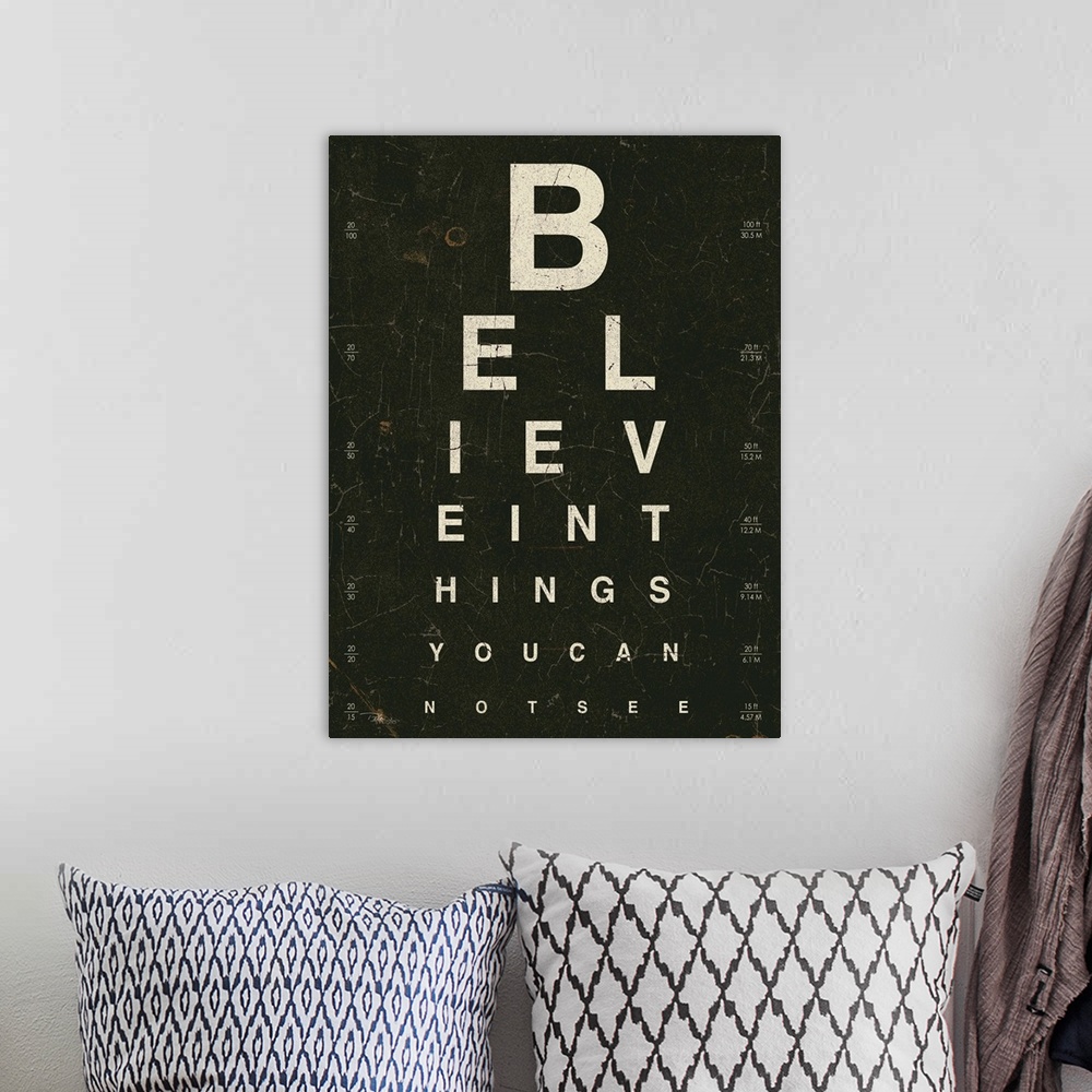 A bohemian room featuring Contemporary artwork of an eye exam chart spelling out an inspirational quote.