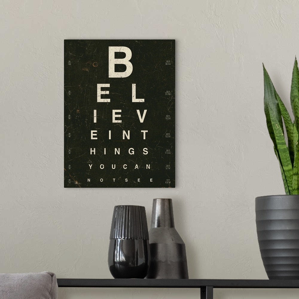 A modern room featuring Contemporary artwork of an eye exam chart spelling out an inspirational quote.