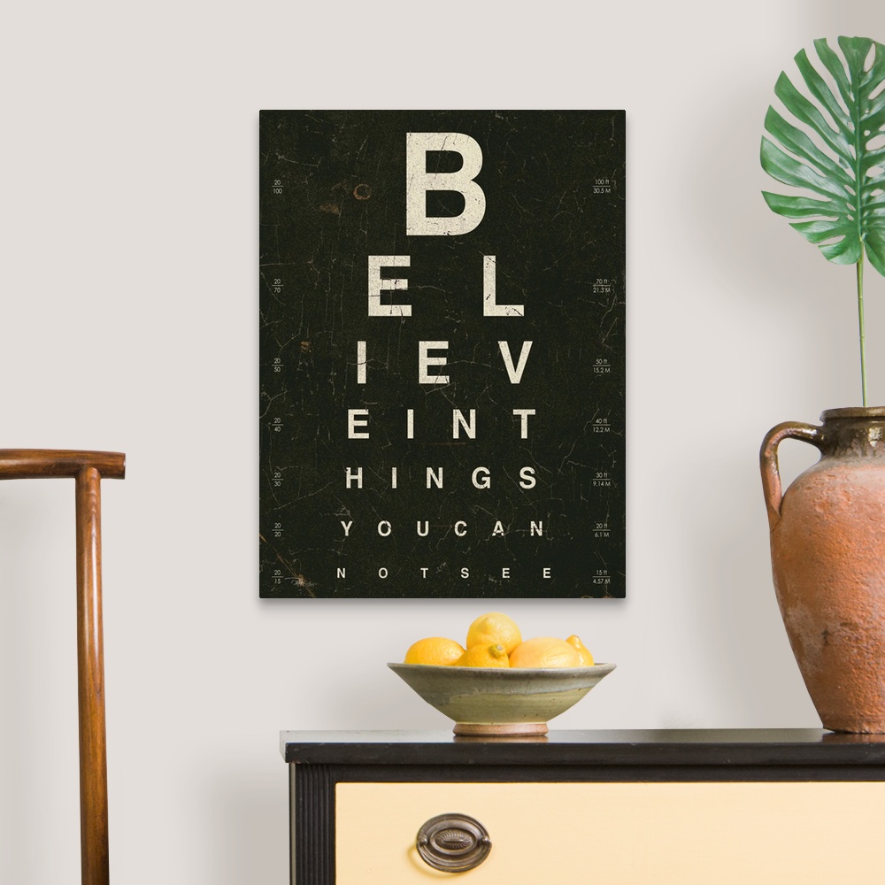A traditional room featuring Contemporary artwork of an eye exam chart spelling out an inspirational quote.