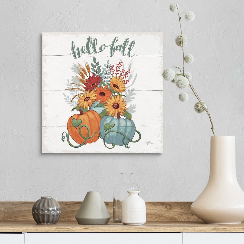 A farmhouse room featuring Decorative artwork of the words "Hello Fall" above a bouquet of fall flowers with pumpkins and a ...