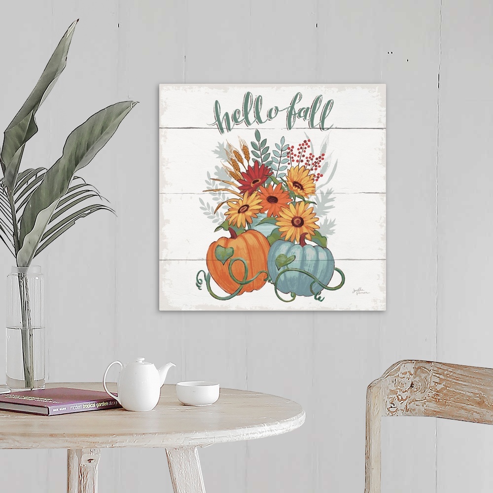 A farmhouse room featuring Decorative artwork of the words "Hello Fall" above a bouquet of fall flowers with pumpkins and a ...