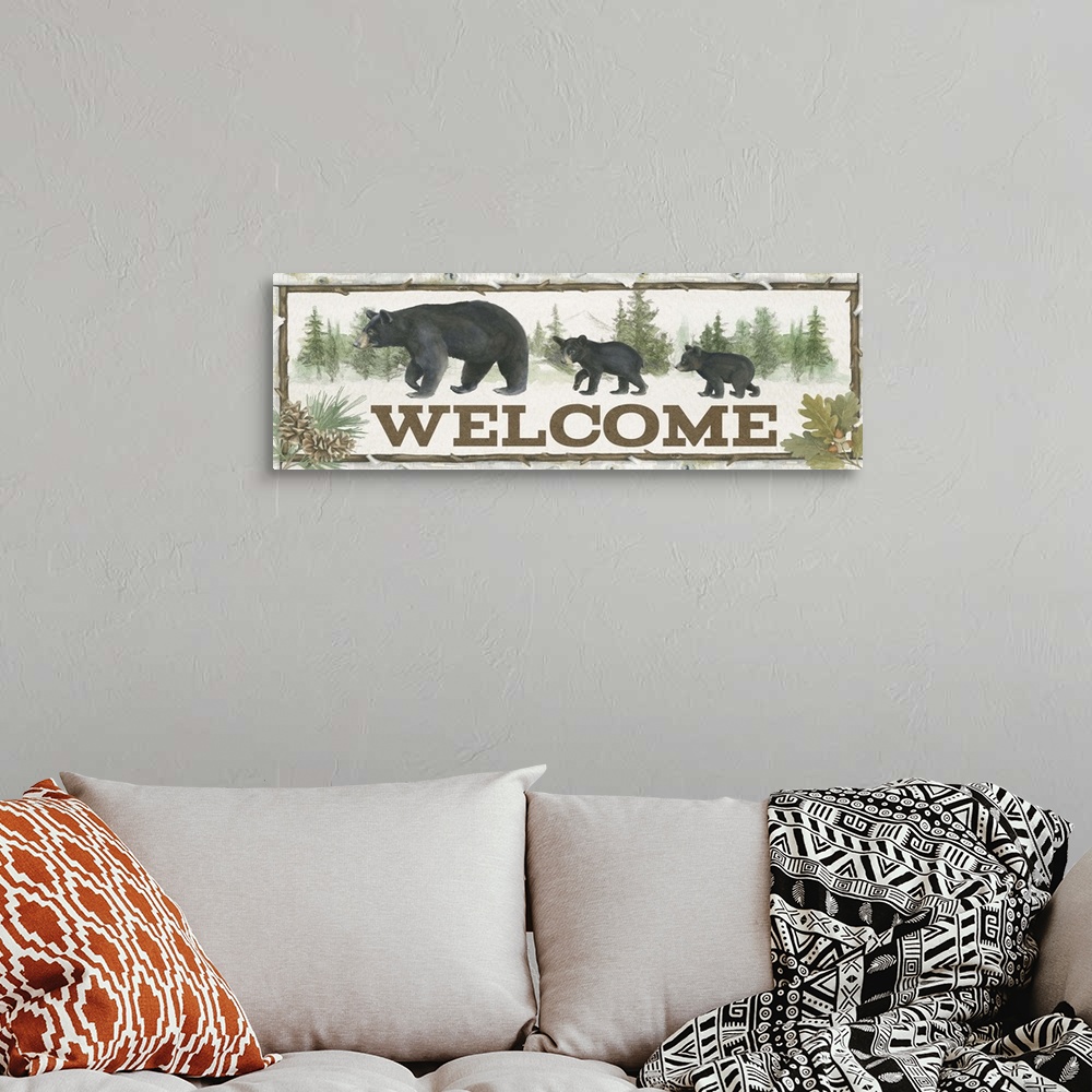 A bohemian room featuring A welcome sign featuring a mother black bear and two cubs.