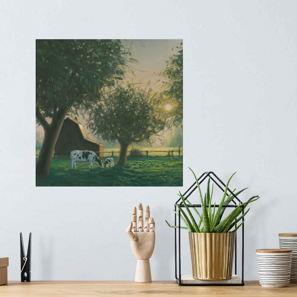 A bohemian room featuring Square painting of a farm scene with grazing cows and a barn at sunset.