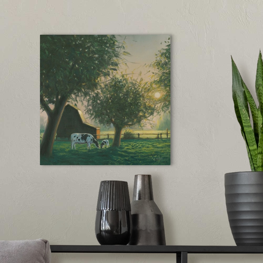 A modern room featuring Square painting of a farm scene with grazing cows and a barn at sunset.