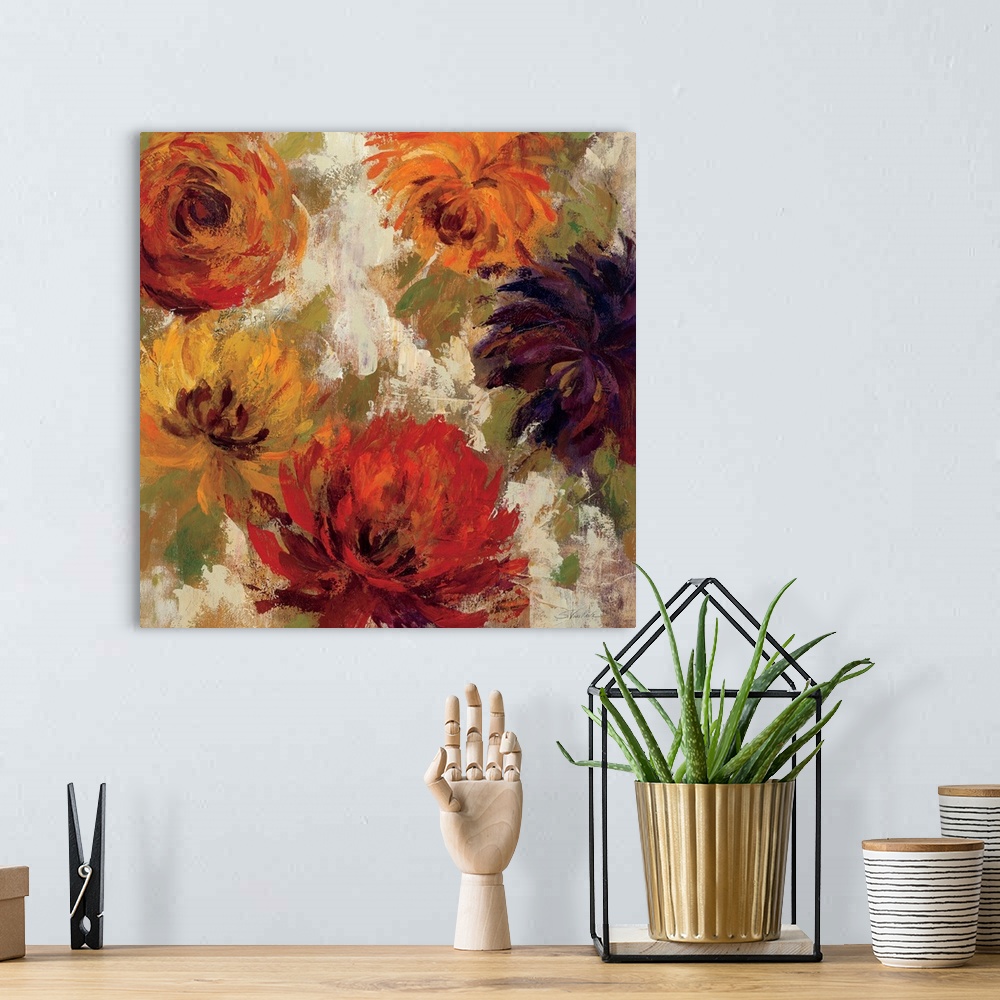 A bohemian room featuring Contemporary artwork of different colored flowers close-up in the frame of the image.