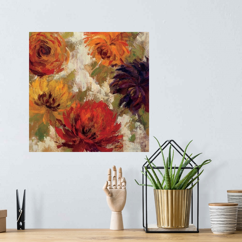 A bohemian room featuring Contemporary artwork of different colored flowers close-up in the frame of the image.