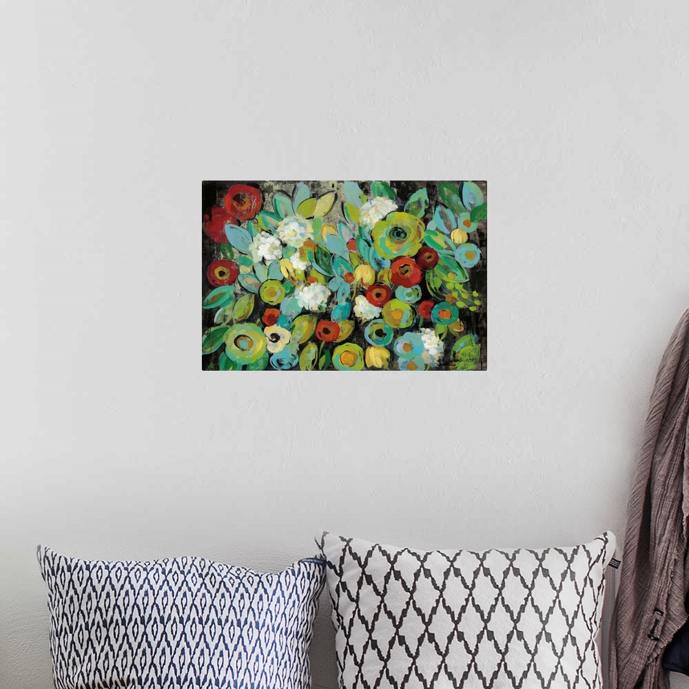 A bohemian room featuring Contemporary floral abstract painting with bright colored flowers on a dark black background.