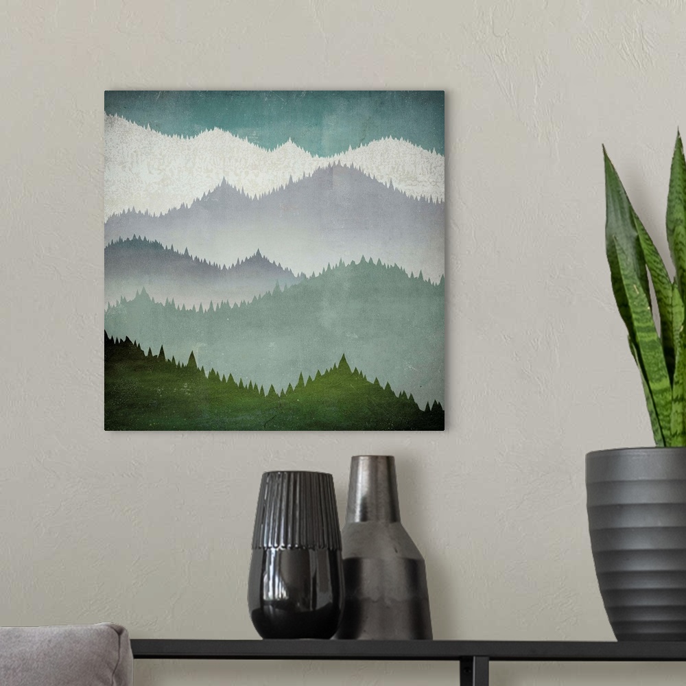 A modern room featuring Contemporary artwork of mountains covered in dense forest in cool tones.