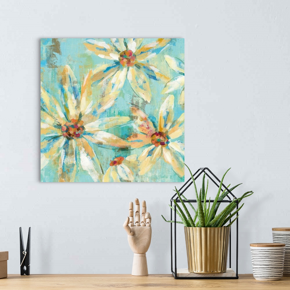 A bohemian room featuring Contemporary painting of white flowers against a light blue background.