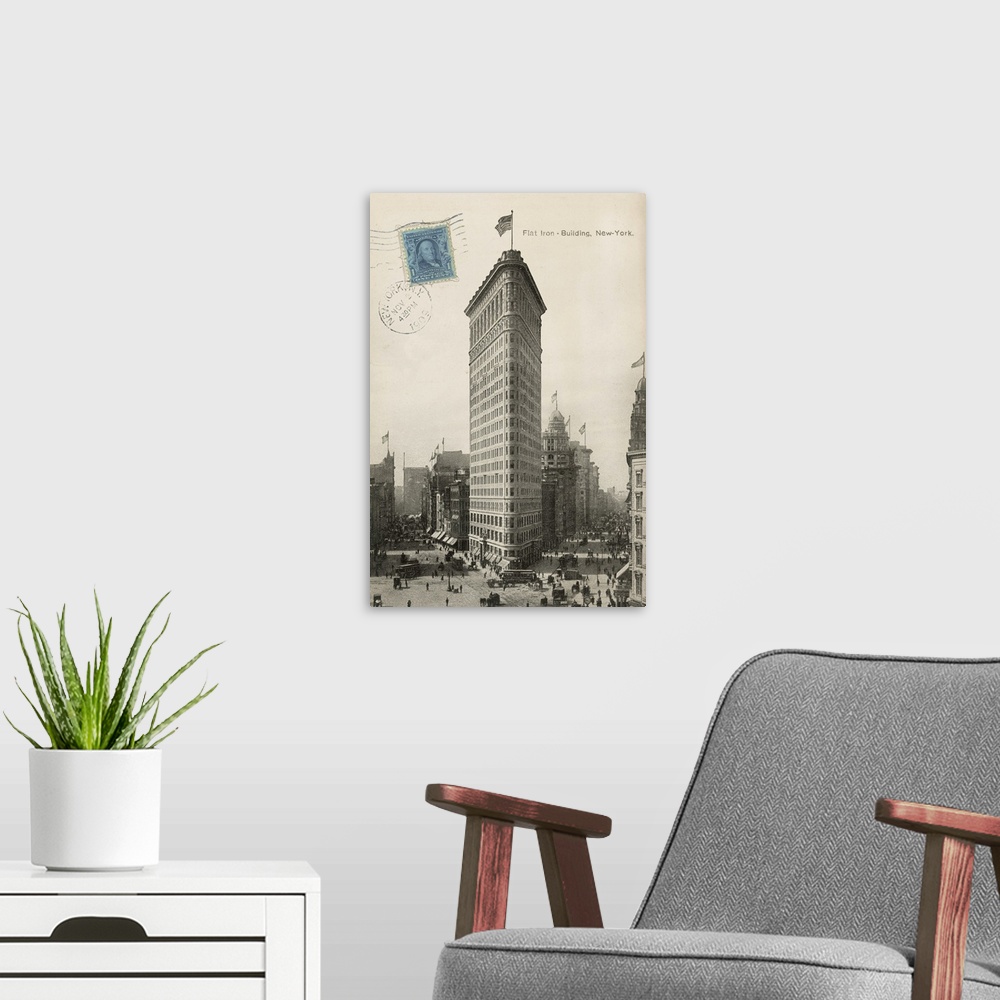 A modern room featuring Vintage photograph of the Flat Iron building with a blue stamp to the left of the image.