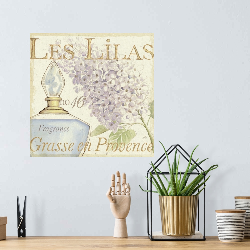 A bohemian room featuring Contemporary artwork of a perfume bottle close in frame, with a flower to the right and text in t...