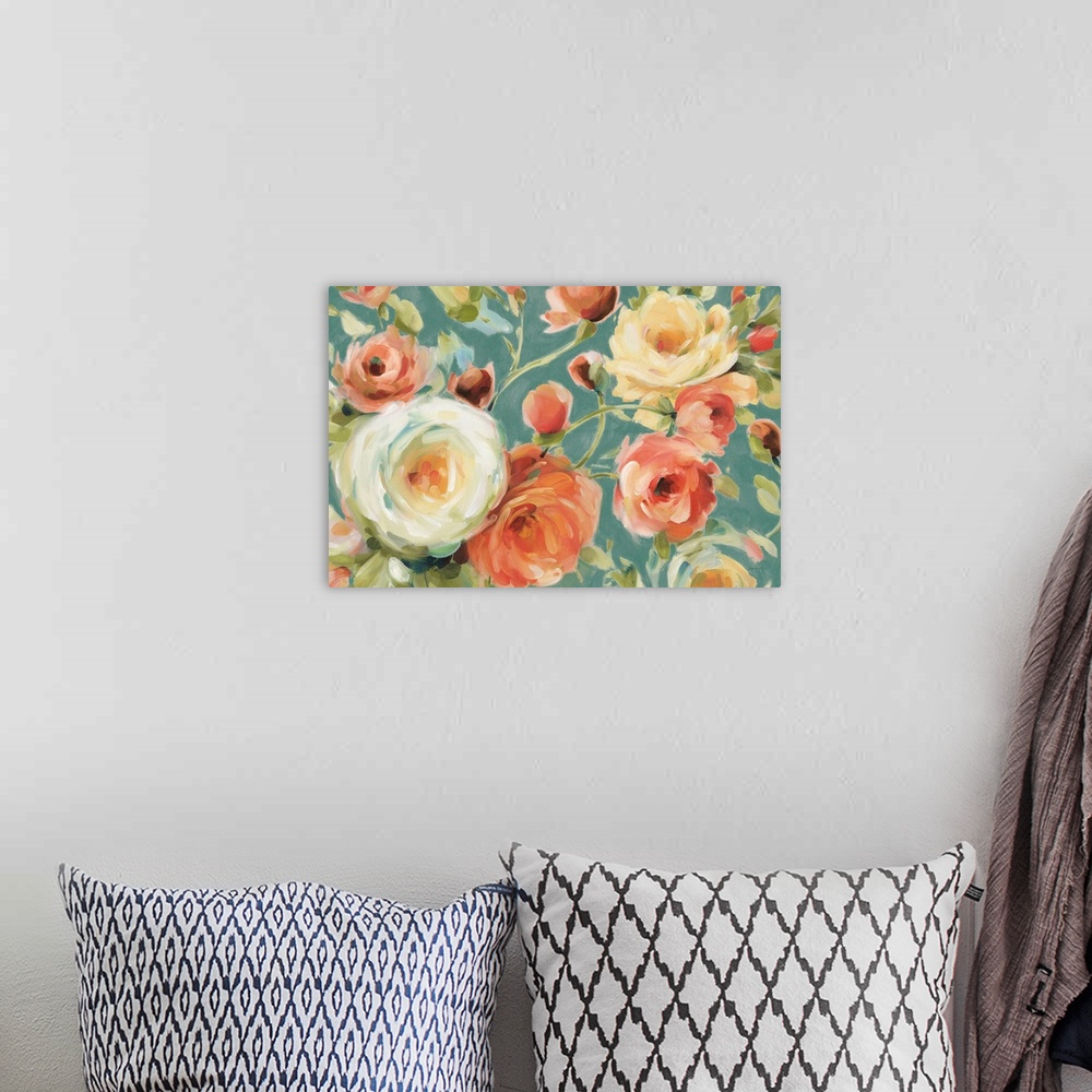 A bohemian room featuring A contemporary painting of large rose blooms in white, orange and pink on a blue background.