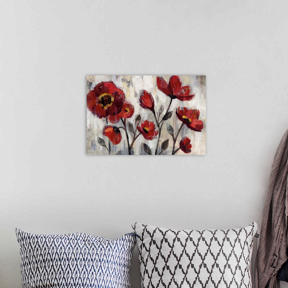 A bohemian room featuring Painting of red poppies on grey.