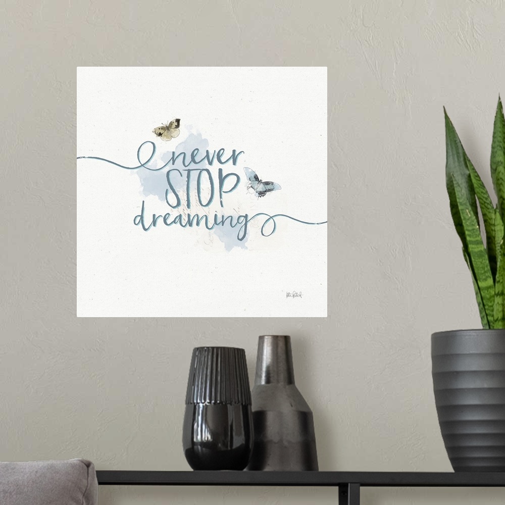 A modern room featuring "Never Stop Dreaming" written in blue with watercolor butterflies on a textured white background ...