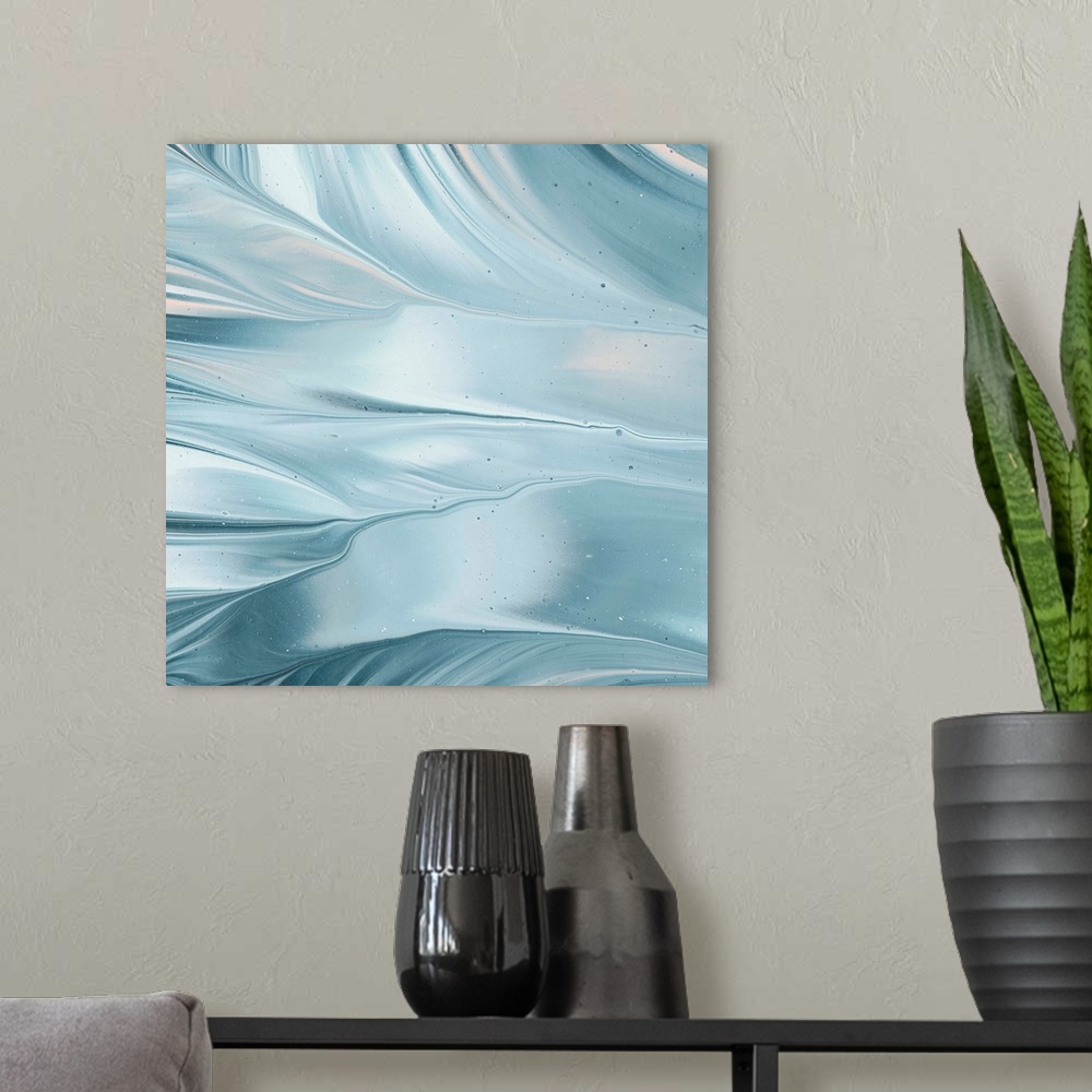 A modern room featuring Square abstract painting of blue and white marbling with hints of pink, creating movement and flo...