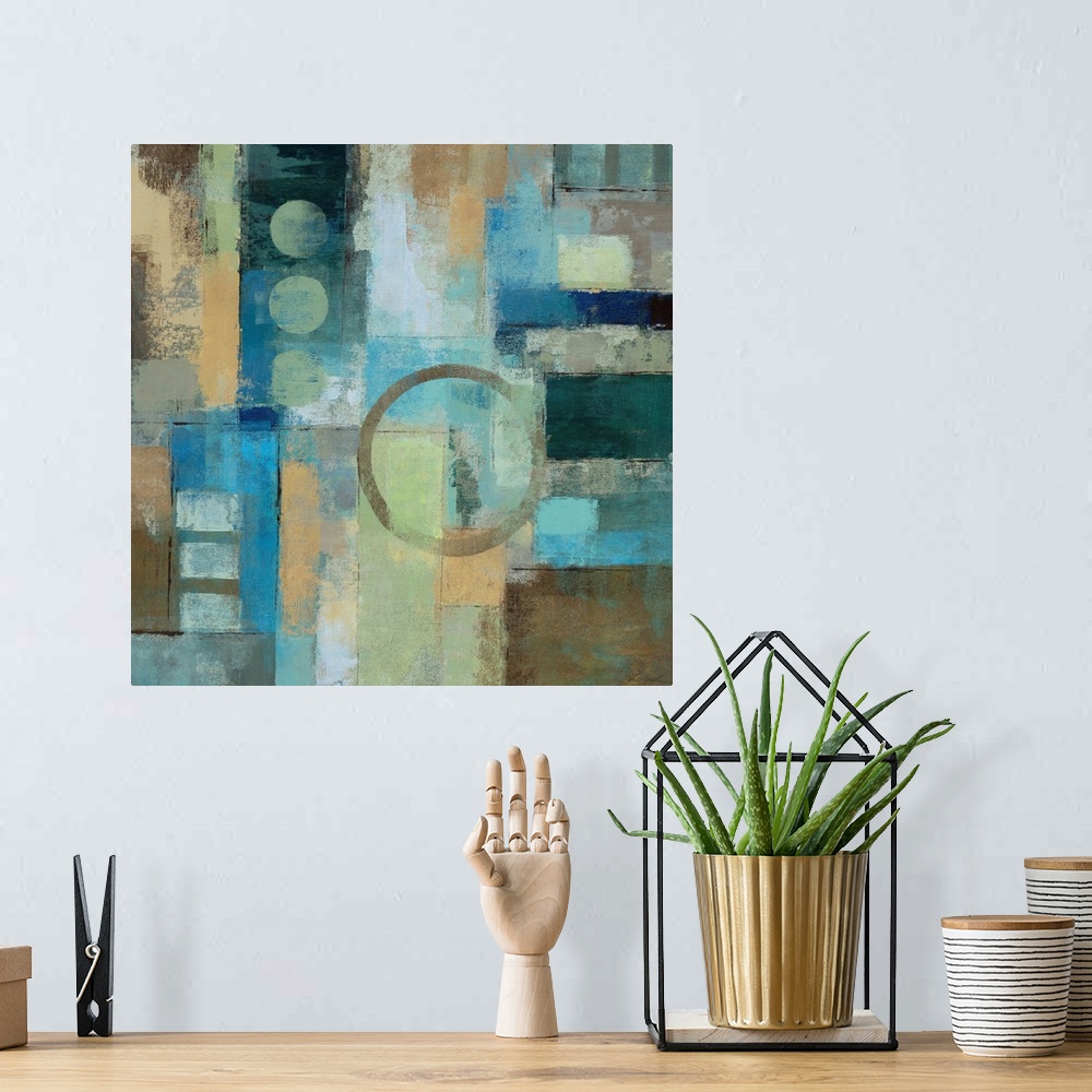 A bohemian room featuring Abstract artwork that uses blocks of colors in different directions with splotches of paint over ...