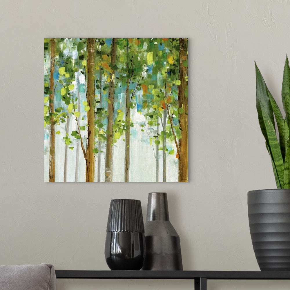 A modern room featuring Contemporary painting of brightly colored trees.  The leaf shapes were made from short vertical b...